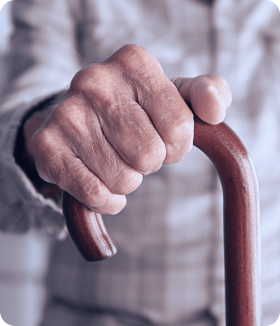 قسم كبار السن وامراض الذاكرة 2 old man hand holding walking stick 1